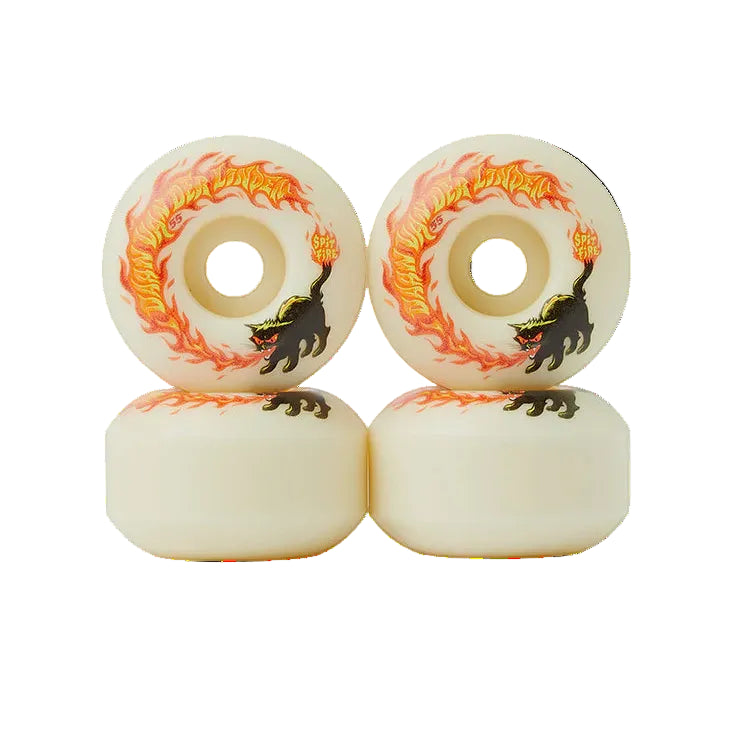 Four skateboard wheels with flame and cat design on a white background