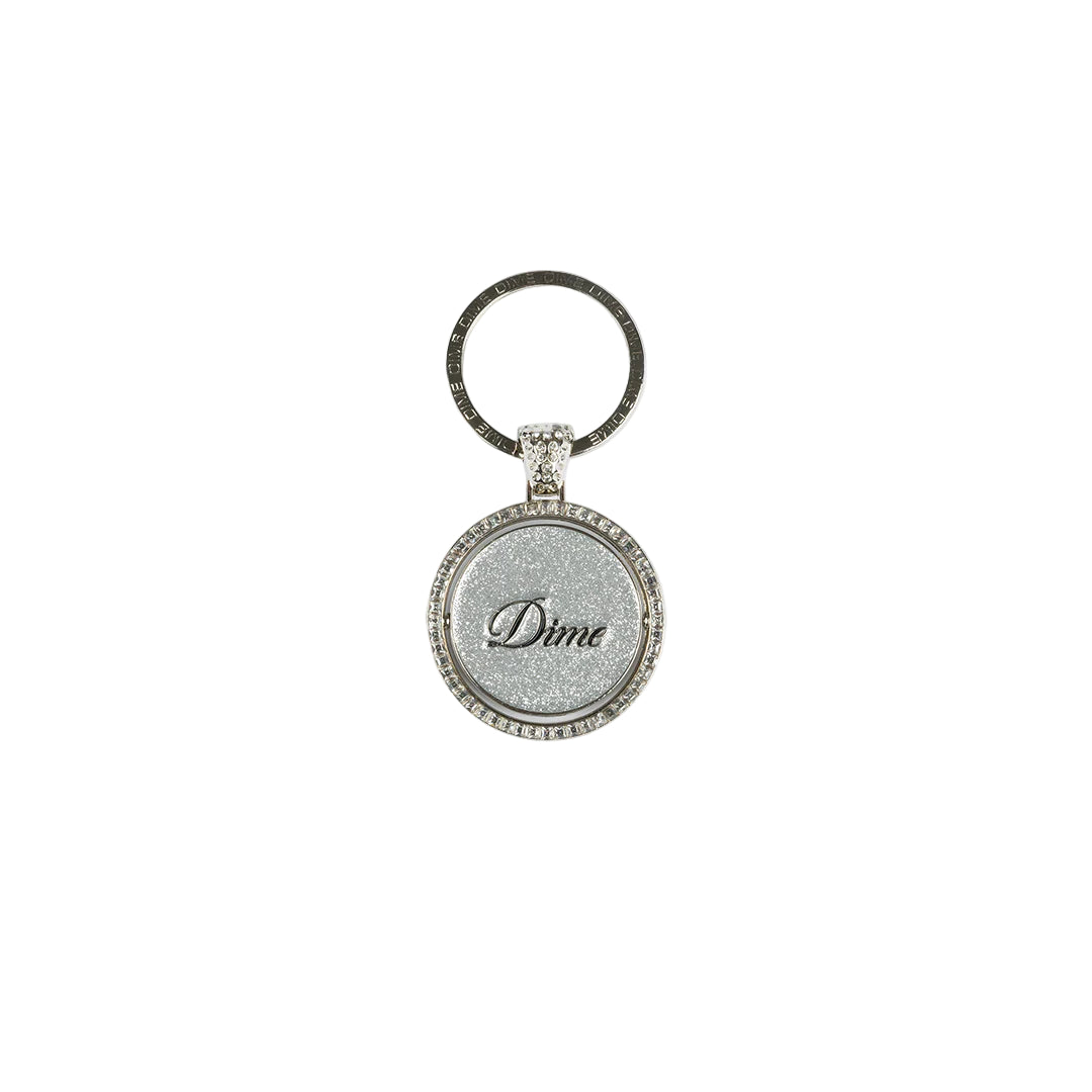 Silver keychain with 'Dime' logo on a white background