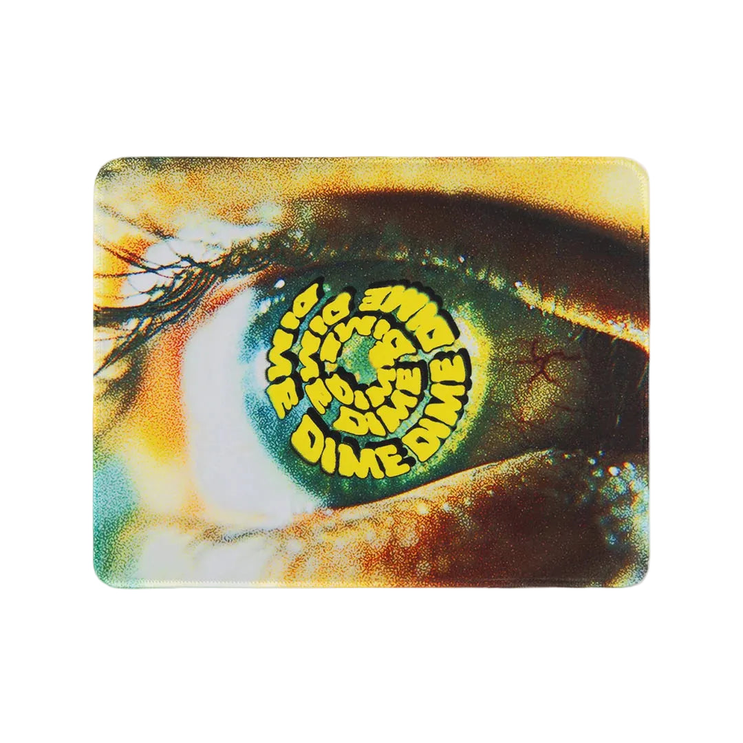 Dim e mouse pad with imagery of a close up of an eye with a spiral Dime graphic in the middle