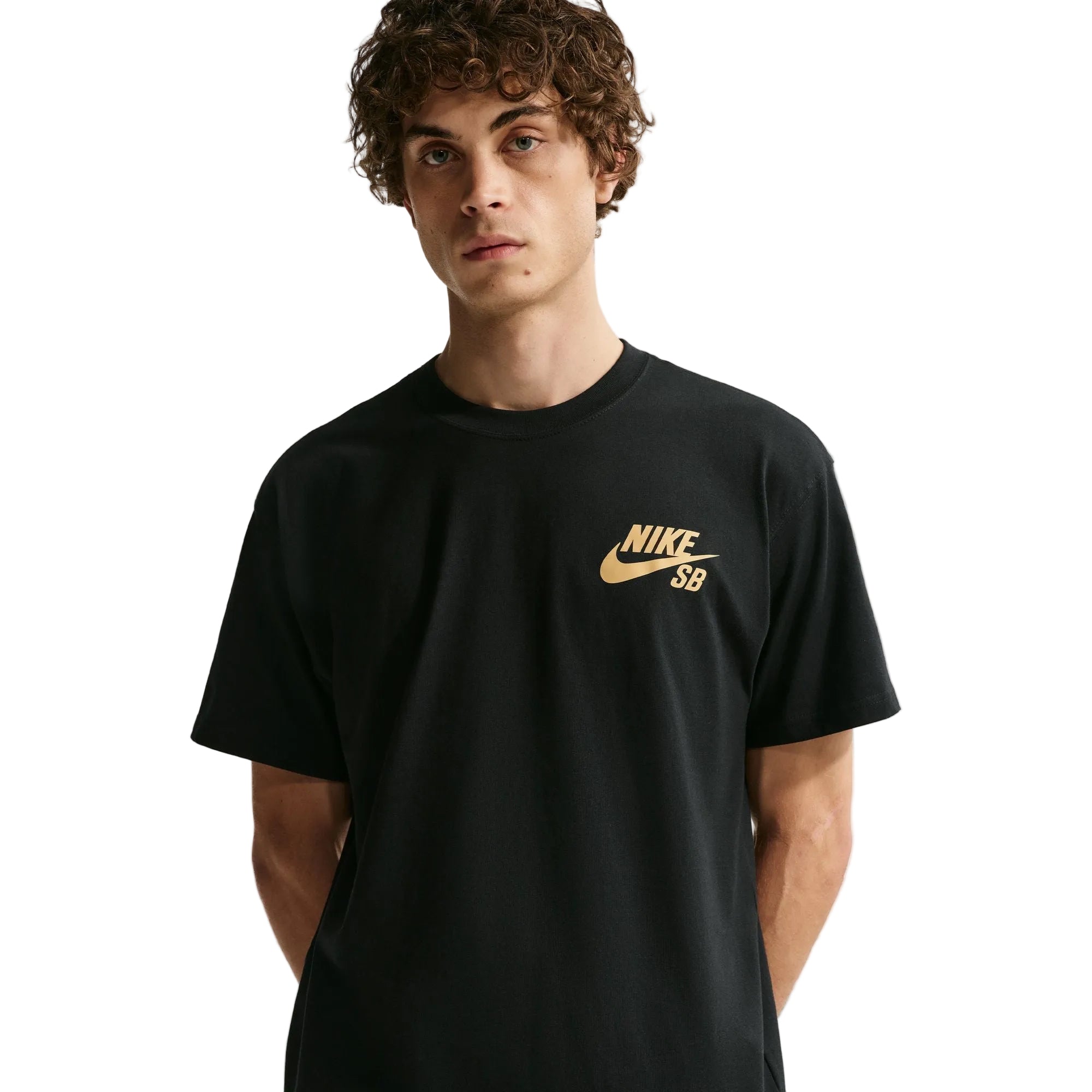 Person wearing a black Nike SB t-shirt with a gold logo on a white background