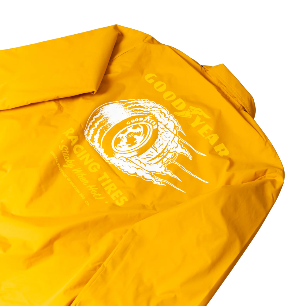 Yellow jacket with a white logo on a white background