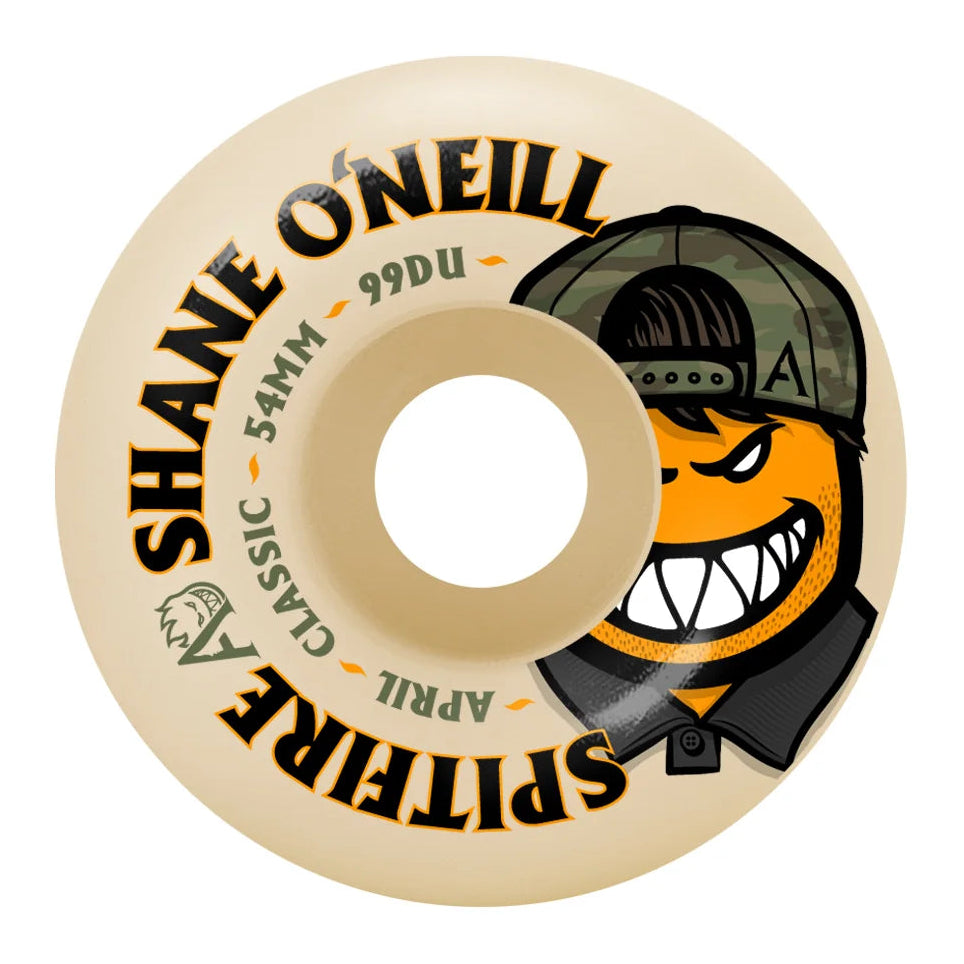 A single skateboard wheel from Shane O'Neill's Spitfire Classic, featuring a cream-colored urethane body with black and orange graphics, including the brand name and a cartoon character wearing a black cap.
