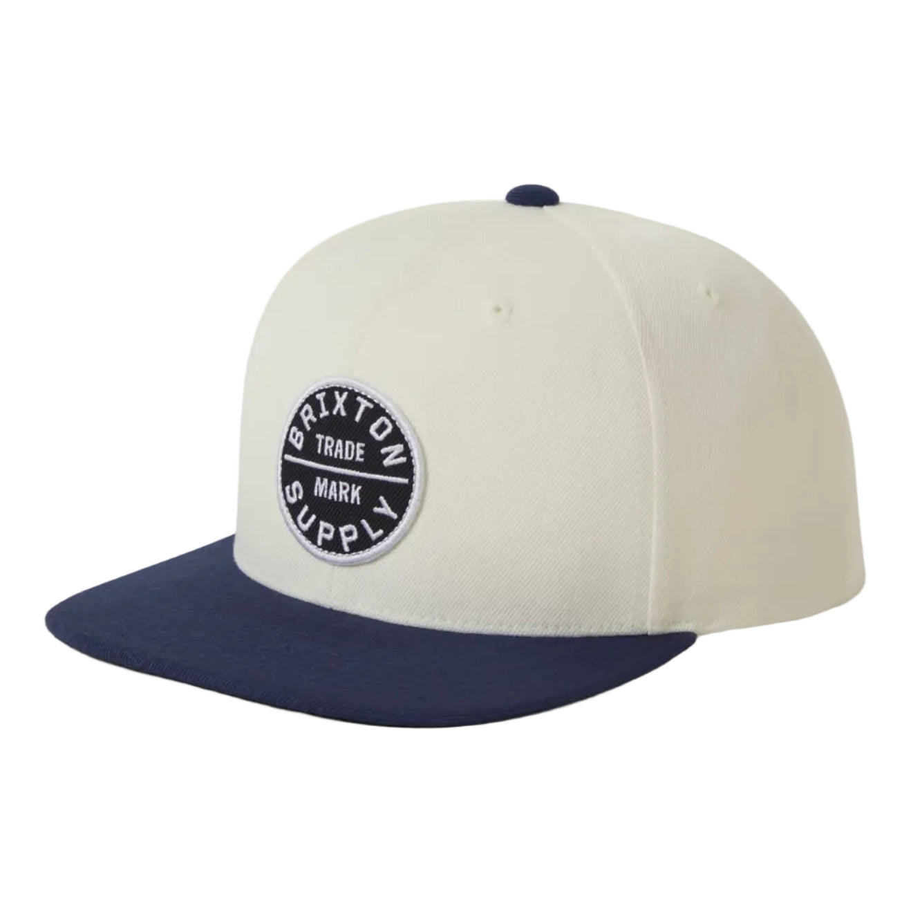 Beige and navy cap with a logo on a white background