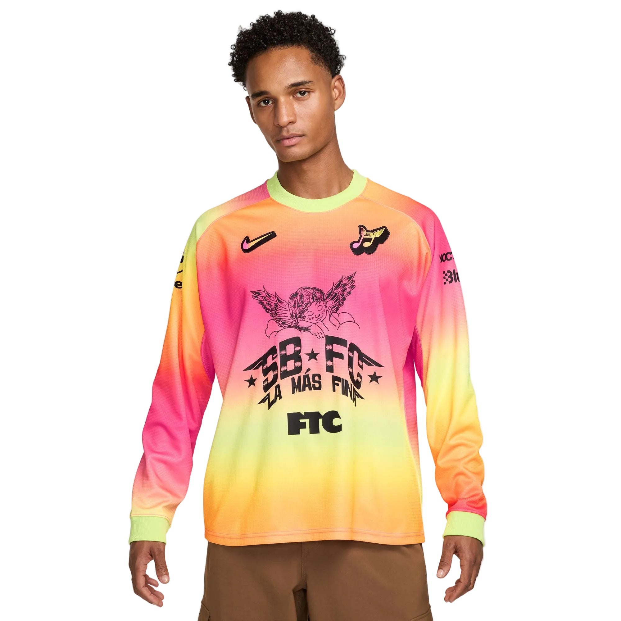 Person wearing a colorful long-sleeve shirt with branding on a white background