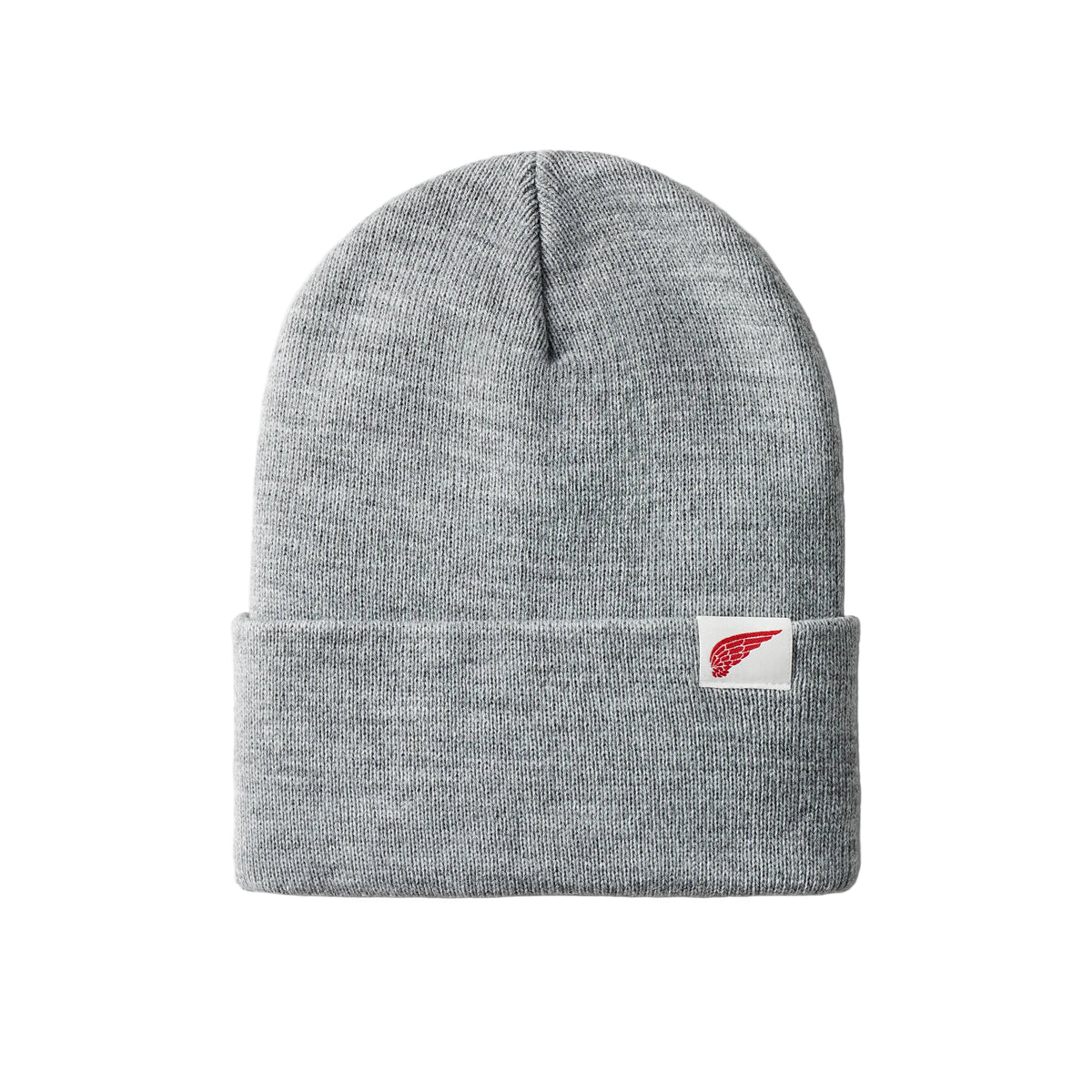 A heather gray ribbed knit beanie hat with a folded cuff, featuring a small white rectangular patch on the side with a red wing-like logo.