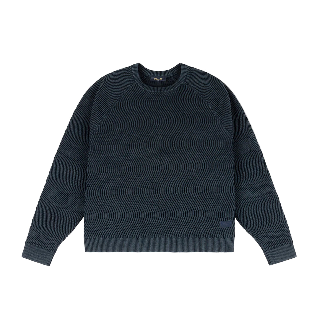 Dark blue textured sweater on a light gray background