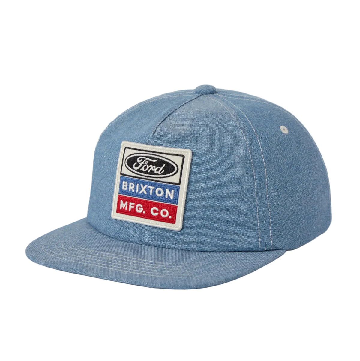 A light blue denim flat-brim cap featuring a front patch with the Ford logo and the text 'BRIXTON MFG. CO.