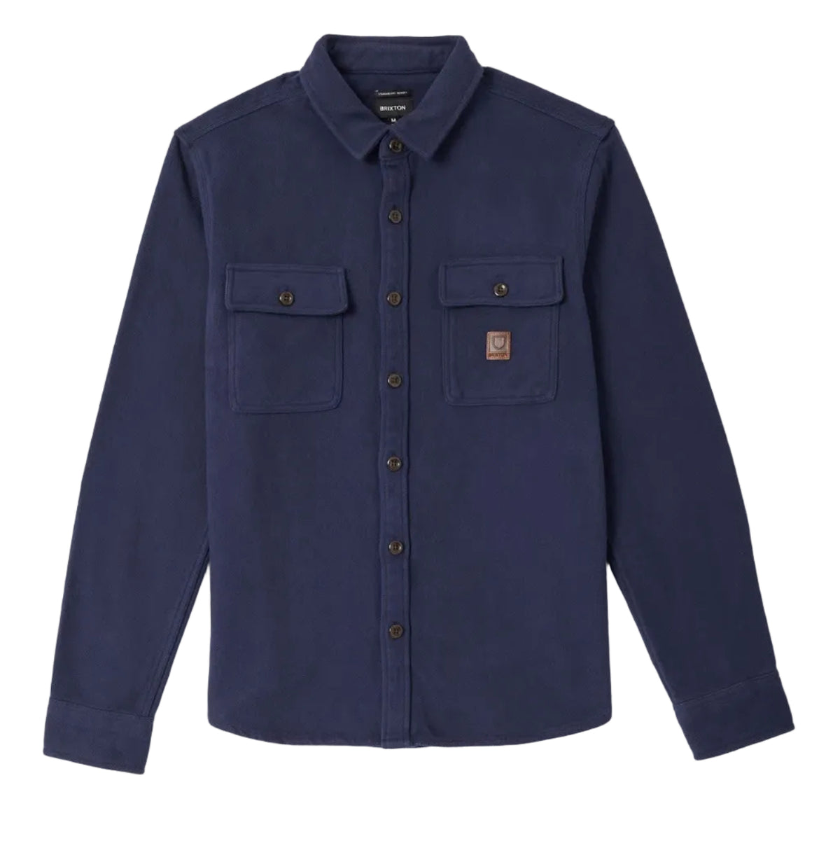 A navy blue long-sleeve button-up shirt jacket with two buttoned chest pockets, displayed flat against a light gray background.