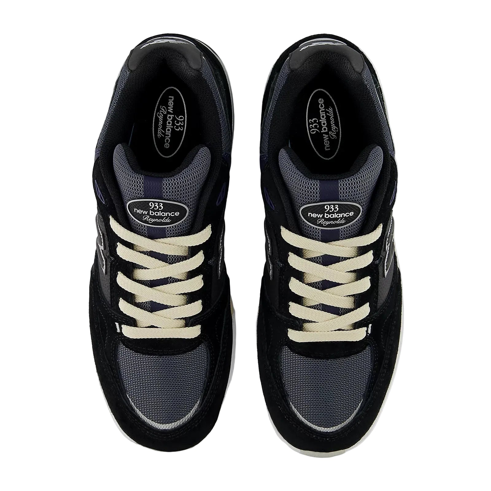 Black New Balance sneakers with white laces on a white background