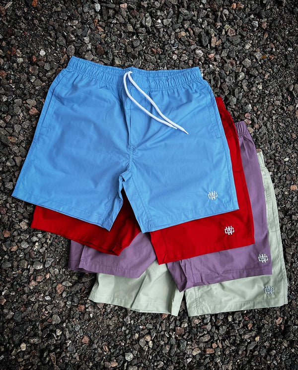 WORKING CLASS MONOGRAM BEACH SHORT - MAUVE/SILVER